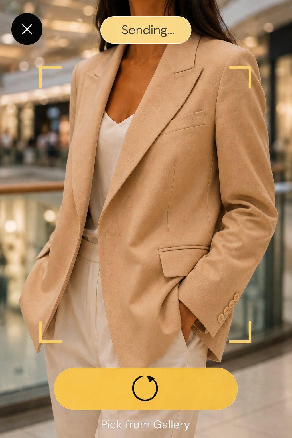 So-Ché app scanning a beige blazer